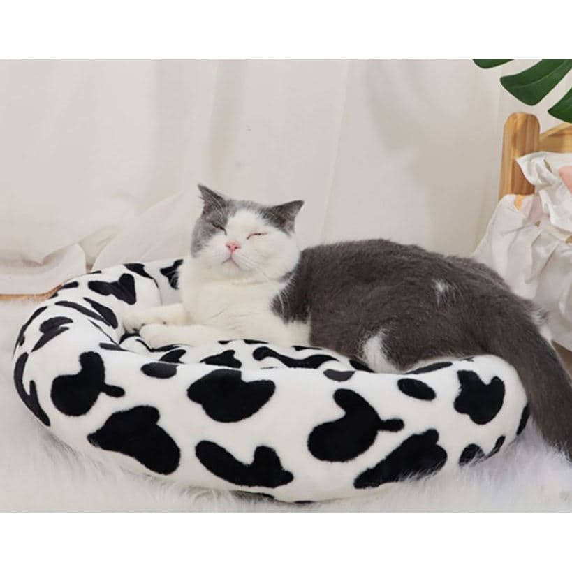 Tempat Tidur Model Tampir Motif Tutul Hitam Putih — gambar 1